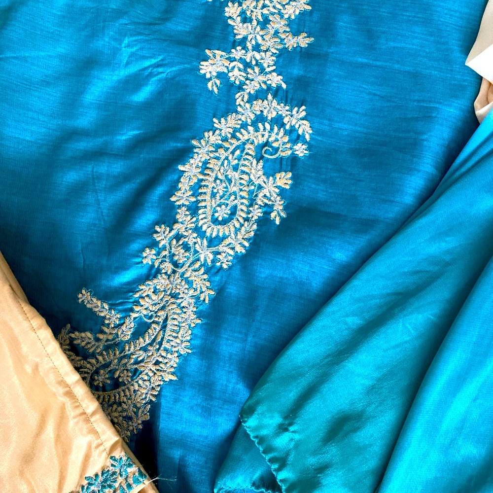 Emerald Green and Gold Asian inspired lndian Lehenga set with pants and dupatta.